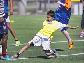 Hall Lake evacuee Atlee Charles was having a good run playing soccer at the SaskTel Center in an activity put on by Astra Soccer Academy on Wednesday.
