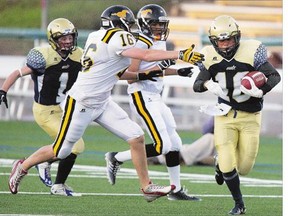 Hans Nuque of the Bethlehem Stars, right, runs away from Kyle Leard of the Mount Royal Mustangs at SMF Field on Thursday. The Stars went on to beat the Mustangs.