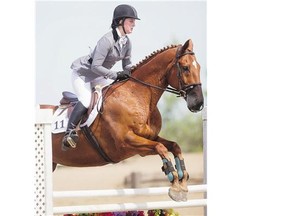 Heather David rides Skyler during the Gymnastic phase of the Canadian Pony Club National Medal Show Jumping Championship at Ebon Stables on Saturday.