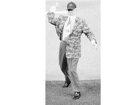 Hockey commentator Don Cherry throws the ceremonial first pitch before the Toronto Blue Jays and Boston Red Sox game at Toronto's Rogers Centre on July 1.