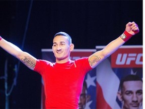 Max Holloway works out at O’Brian’s Event Centre Friday, Aug. 21, 2015 prior to a weekend UFC card.
