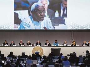 IAAF president Lamine Diack, seen speaking at the 128th IOC session, has watched the world championships thrown into turmoil by new accusations of widespread doping and experts denouncing an anti-doping system compromised by leniency.