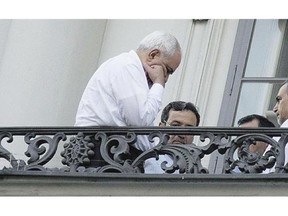 Iranian Foreign Minister Mohammad Javad Zarif, left, gathered with his entourage on Saturday on a balcony of the Palais Coburg Hotel in Vienna, where the Iran nuclear talks meetings are being held.