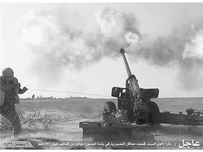 An ISIL militant fires artillery against Syrian forces in Hama city, Syria. Special troops called Inghemasiyoun are possibly the deadliest weapon in the extremist group's arsenal.