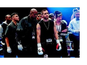 Jake Gyllenhaal, centre right, and Forest Whitaker, centre left, star in Southpaw, a fresh take on the conventional boxing movie.