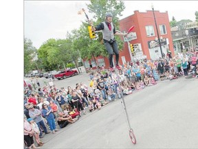 Jamey Mossengren of UniProShow performs on Broadway Avenue during the PotashCorp Fringe Festival.