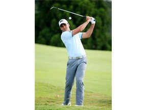 Jason Day of Australia plays a shot during a practice round for the Tour Championship By Coca-Cola at East Lake Golf Club Wednesday in Atlanta, Ga.