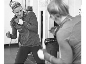 Jelena Mrdjenovich trains at Avenue Boxing Gym in Edmonton in advance of her title unification bout in Buenos Aires on Saturday.