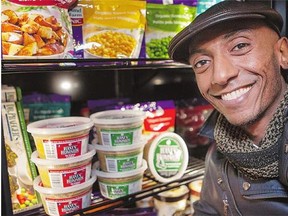 Yohannes Petros with some of his Hanes Hummus. He won a legal battle launched by the underwear giant with the same name in 2015.