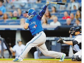 Josh Donaldsonof the Toronto Blue Jays follows through on a first inning home run against the New York Yankees at Yankee Stadium on Friday.