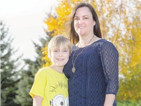 Josiah Orr, shown Friday with his mother Melissa, has recovered from a rare neurological disease that caused extreme OCD when he got a strep infection.