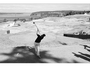 Justin Rose, of England, watches his tee shot on the 14th hole during a practice round for the U.S. Open at Chambers Bay on Wednesday in University Place, Wash. The course has become the centre of attention.