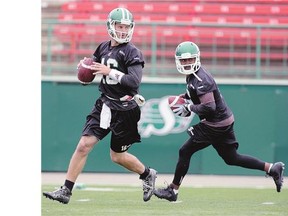 Kevin Glenn, right, is to start at quarterback for the Saskatchewan Roughriders on Saturday against the visiting Ottawa Redblacks, with Brett Smith, left, now assuming the No. 2 role.