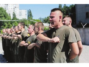 Last week, U.S. lawmakers moved to block 'the training of the Ukrainian neo-Nazi paramilitary militia Azov Battalion,' shown here after a training session in Kyiv, Ukraine.