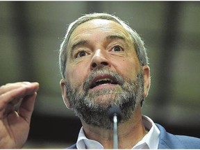 NDP Leader Thomas Mulcair, shown Wednesday at an auto-parts manufacturing plant in Niagara Falls, Ont., said in a CBC interview that aired Wednesday night that, if elected, he will reduce taxes for smalland medium-sized business while hiking the rate on corporations.