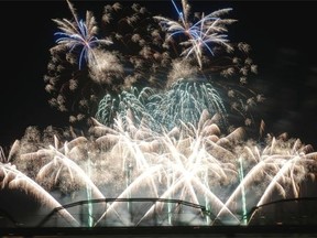 A view from the back of the Prairie Lily riverboat as fireworks light up the sky over the Broadway and Traffic Bridges during the PotashCorp Fireworks Festival in Saskatoon, Saturday.