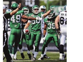 Linebacker Jake Doughty, centre, made his second consecutive start for the Saskatchewan Roughriders on Friday against the host B.C. Lions.