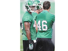 Linebacker Jeff Knox Jr., left, is among the first-year Roughriders who have made contributions on defence.
