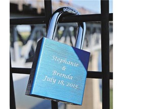 Love locks were hanging again Friday on the CPR bridge at the weir.