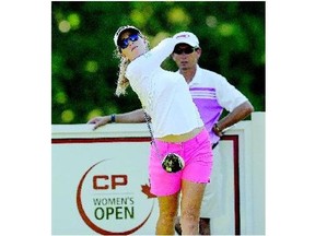 LPGA star Paula Creamer fires a tee shot during a practice round at the Canadian Pacific Women's Open at the Vancouver Golf Club in Coquitlam, B.C., on Tuesday.