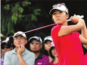Lydia Ko of New Zealand hits a tee shot during final-round action at the Canadian Pacific Women's Open at the Vancouver Golf Club Sunday.