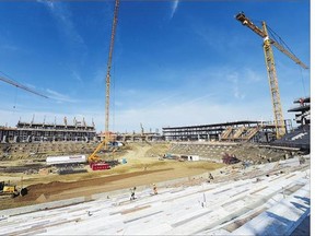 A major building permit for part of the new Mosaic Stadium, issued in July, helped boost the province's totals for the month.