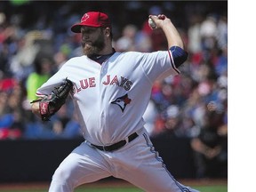 Mark Buehrle of the Toronto Blue Jays went six-plus innings to earn his 14th win of the season on Sunday against the Detroit Tigers.