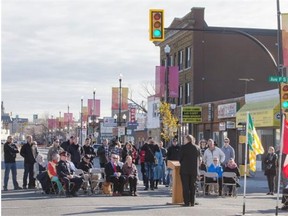 Mayor Don Atchison speaks at a ceremony to officially mark the completion of the 20th Street West Streetscape Improvement Project, Thursday, Oct. 15, 2015.