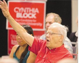 A member of the audience participates in a town hall meeting with Liberal Leader Justin Trudeau in Saskatoon on Thursday.