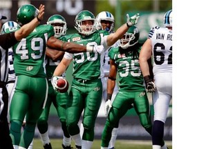 Linebacker Jake Doughty, No. 50, shown celebrating his first CFL interception Sunday against the Toronto Argonauts, made his second start for the Saskatchewan Roughriders on Friday against the host B.C. Lions.