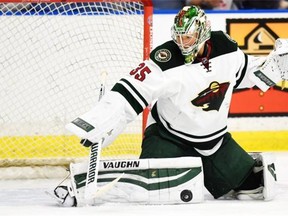 Minnesota Wild goaltender Darcy Kuemper stops a shot from the Edmonton Oilers during the first period of an NHL pre-season hockey game in Saskatoon, Sask., on Saturday, September 26, 2015.
