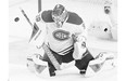 Montreal Canadiens goalie Mike Condon makes a save during the second period of a 3-1 win over the Ottawa Senators on Sunday, winning his first NHL start after earning the backup job in training camp.