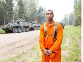 MONTREAL LAKE, SASK--JULY 09 2015- Mire Farah poses for a photograph as he and his colleagues with the Canadian military aid in forest fire fighting at Montreal Lake on Thursday, July 9th, 2015.LIAM RICHARDS/STAR PHOENIX)