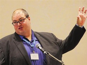 Murad Al-Katib, review adviser for the Canadian Transportation Act, speaks at the Grain Transport Forum at the Saskatoon Inn on Monday.