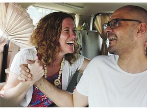 Neil Bantleman and his wife Tracy Bantleman hold hands after the Canadian teacher's release from Jakarta's Cipinang Prison on Friday.