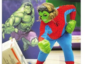 Nevach Grieman morphs into the Hulk at the obstacle course at Cosmo Civic Centre on Wednesday. Four children, their Big Brothers-Big Sisters mentors, Marvel performers and media personalities competed in a variety of challenges inspired by Marvel superheroes.