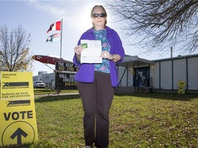 Stephanie Sydiaha poses outside an advance polling station on Avenue C north on Saturday, October 10th, 2015.