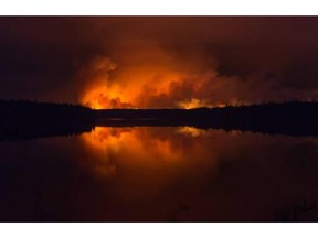 A massive wildfire is within two kilometres of Pinehouse, a northern community where remaining residents have been without power for more than a week. Above is a photo of the Eli Fire, which is threatening homes in La Ronge. Courtesy of Scott Knudsen.