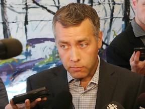 Saskatchewan NDP Leader Cam Broten, during a media scrum in Saskatoon on July 21, 2015, called for an independent review into how the province dealt with wildfires that forced thousands of people from their homes
