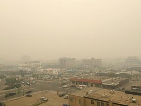 Downtown Saskatoon is obscured by smoke from northern Saskatchewan forest fires, June 29, 2015.