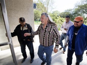 First Nations representatives enter Queen's Bench Courthouse in Saskatoon to appeal the First Nations Accountability Act, Wednesday, August 19, 2015. (Greg Pender/The StarPhoenix)