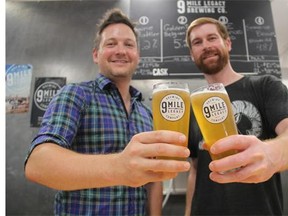 Founders of 9 Mile Legacy Brewing, Shawn Moen and Garrett Pederson, can be seen at the 9 Mile brewhouse, where the craft brewery creates and perfects its different beers on Sunday afternoon.