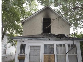 Damage at an early morning house fire in the 300 block of Avenue J South.