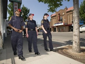 Community support officers on 20th Street are (from left to right) Jonathan Keens-Douglas, Lesley Prefontaine and Krista Townsend in Saskatoon July 11, 2012.