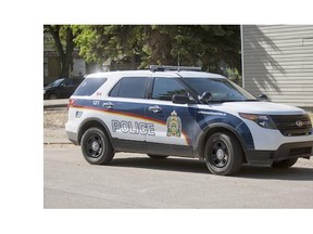 Saskatoon police are looking for three people who robbed a business with a hammer.