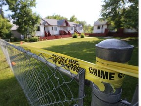 Saskatoon police investigate a shooting in the 300 block of Avenue R South on June 22, 2015.