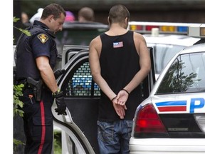 Saskatoon police were held at bay at a day long stand off in the 100 block Avenue O. S. that ended later in the afternoon with multiply people being removed from the house and taken into custody.