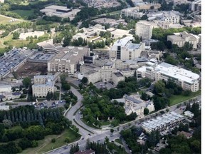 A Saskatoon woman wants to caution staff and residents at Royal University Hospital after a bizarre incident earlier this week in which she and two colleagues were surrounded by about six men wearing dark clothing.