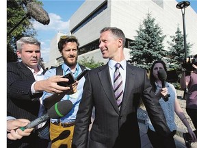 Nigel Wright, former chief of staff to Stephen Harper, leaves court Monday. It can be tricky to know who the alleged perpetrator is at the trial of Sen. Mike Duffy, writes Christie Blatchford.