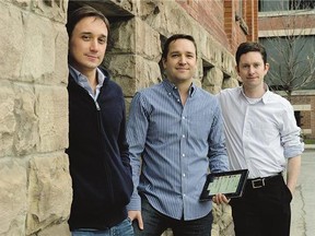 Noah Godfrey, left, Pema Hegan and Andrew McGrath, founders of Checkout 51, a coupon app for smartphones and tablets, near their offices in Toronto in 2012. A unit of News Corp. is buying Checkout 51, increasing the app's reach in the U.S.